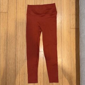 Victoria’s Secret Leggings. Size small. Rusty orange red color